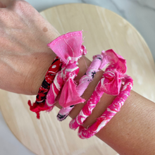 Load image into Gallery viewer, Hand wearing multiple bangles wrapped in bandanas