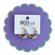 Load image into Gallery viewer, Gold hoop earrings with bright colored stripes of enamel painted on for a fun pop of color