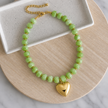 Load image into Gallery viewer, Colorful resin bead statement necklace with removable large gold heart charm and tarnish resistant clasp makes a perfect gift or accessory for date night