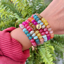 Load image into Gallery viewer, smooth gemstone beads in warm tones of pink yellow, blue and brown make the perfect stack for fall. Stretchy for the perfect bracelet fit.