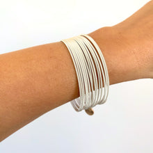 Load image into Gallery viewer, Silver coil bracelets stacked minimalist everyday style
