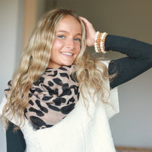 Load image into Gallery viewer, model wearing a bracelet stack of 18k gold plated beads and pearls perfect for all outfits