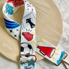 Load image into Gallery viewer, Adjustable bag strap with a collage of soccer themed graphics in support of the Kansas City Current women's team