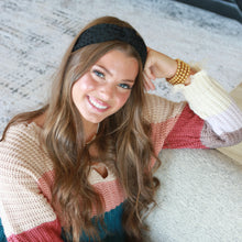 Load image into Gallery viewer, modeling wearing a stack of 18k gold plated beaded bracelets.  they make a statement and look beautiful 
