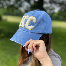 Load image into Gallery viewer, Vintage style blue ball cap with chenille varsity KC letter detail is perfect for Royals games showing Kansas City pride.
