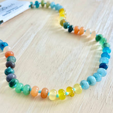 Load image into Gallery viewer, Neutral gemstone necklace layered with gold chains
