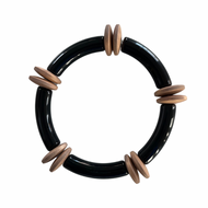 Black beaded bracelet stacked with gold bracelets