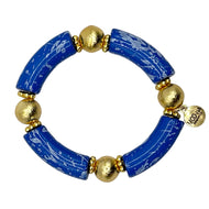 Blue splatter acrylic beaded bracelet with gold accents