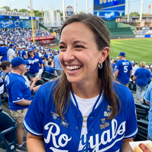 Load image into Gallery viewer, Woman Kansas City Royals fan wearing blue enamel striped hoop earrings at the stadium 

