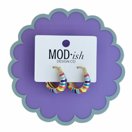 Gold hoop earrings with bright colored stripes of enamel painted on for a fun pop of color