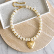 Load image into Gallery viewer, Resin bead statement necklace with removable large gold heart charm and tarnish resistant clasp makes a perfect gift or accessory for date night
