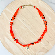 Orange bandana necklace with statement charm