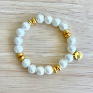 Pearl beaded stretch bracelet with gold accents