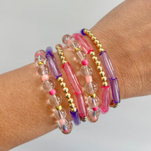 Load image into Gallery viewer, Pink bracelet stacked with gold bracelets feminine look
