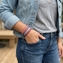 Load image into Gallery viewer, Colorful seed beads and gold plated beads in Ole Miss team colors create the perfect stack for game day
