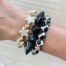 Load image into Gallery viewer, Tibetan agate bracelet stacked with gold bracelets
