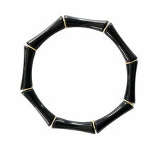 Load image into Gallery viewer, Black acrylic bracelet stacked with gold bracelets

