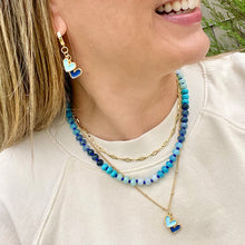 Load image into Gallery viewer, gold plated necklace with a royal blue and light blue enamel heart charms are perfect for Kansas City Royals games or as a gift
