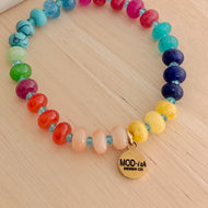jewelry-toned natural gemstone beads on an elastic stretch cord add a fun pop of color to your bracelet stack