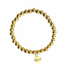 Load image into Gallery viewer, 18k gold plated beads on a durable stretch cord creates a comfortable bracelet that is perfect for stacking
